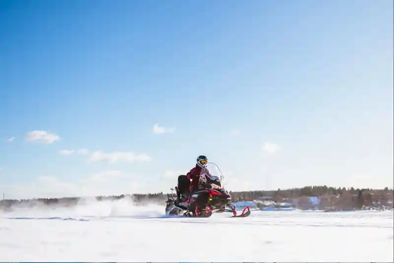 Snowmobiling, Ice Fishing & Lappish Lunch – Catch the Arctic Spirit